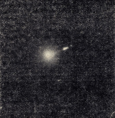 Рис. 191. Фотография центральной части радиогалактики М 87